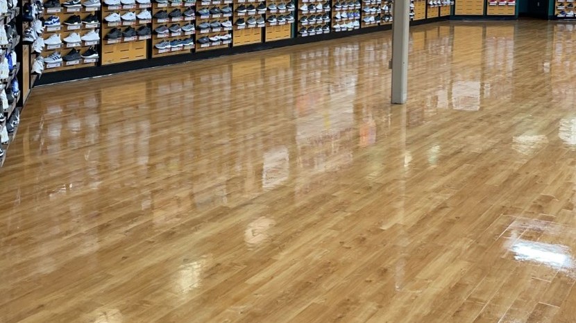 Polished wood-look LVT athletic flooring at Dick's Sporting Goods