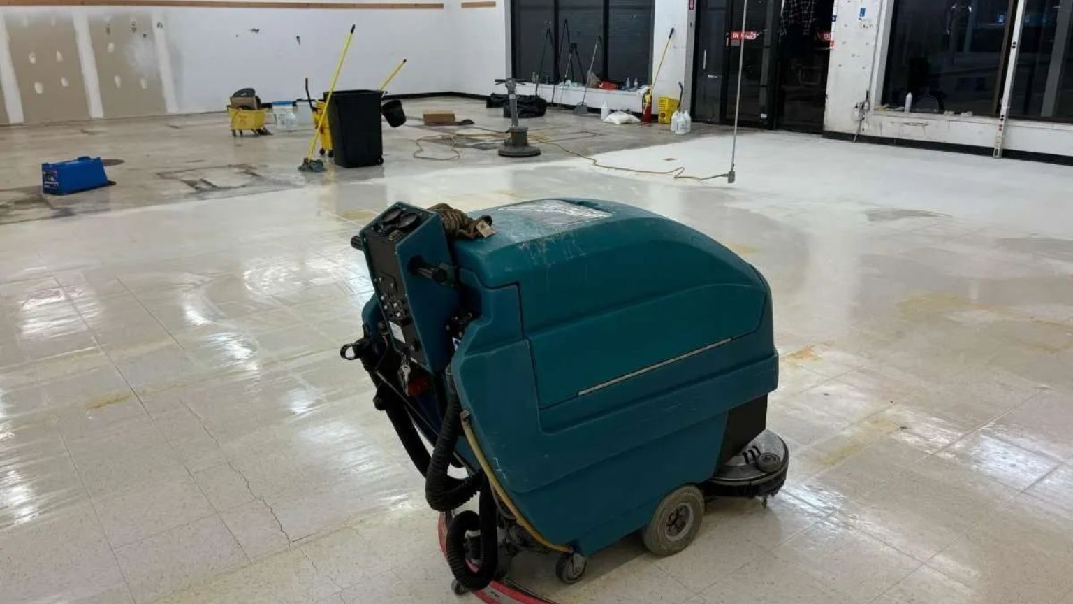Mechanical scrub and recovery using commercial autoscrubber during restoration